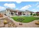 Spacious backyard featuring artificial turf, beautiful desert landscaping and a pool at 4607 E Sierra Sunset Trl, Cave Creek, AZ 85331