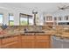 Well-appointed kitchen with granite countertops, a stainless steel sink, and backyard views at 4607 E Sierra Sunset Trl, Cave Creek, AZ 85331