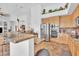 Modern kitchen with large island, stainless appliances, and tile floors at 4607 E Sierra Sunset Trl, Cave Creek, AZ 85331