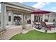 Outdoor patio with plenty of seating, an umbrella and beautiful landscaping at 4607 E Sierra Sunset Trl, Cave Creek, AZ 85331