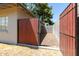 Enclosed backyard area with a privacy fence, gate, and low-maintenance landscape at 4713 E Cambridge Ave, Phoenix, AZ 85008