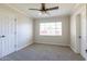 Comfortable bedroom with carpet, natural light and a ceiling fan for added comfort at 4713 E Cambridge Ave, Phoenix, AZ 85008