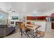 Open-concept living area featuring a living room, dining area and a kitchen with warm wood accents at 5005 E Baker Dr, Cave Creek, AZ 85331