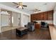 Inviting living room featuring a cozy chair and built-in shelving for storage at 5005 E Baker Dr, Cave Creek, AZ 85331
