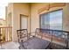 Comfortable balcony seating with wrought iron furniture, perfect for enjoying outdoor living space at 5350 E Deer Valley Dr # 4239, Phoenix, AZ 85054