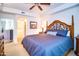 Comfortable bedroom with ceiling fan, nice bed, and view to the bath and closet areas at 5350 E Deer Valley Dr # 4239, Phoenix, AZ 85054