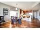 Dining room with hardwood floors and views of the kitchen and a breakfast bar at 5350 E Deer Valley Dr # 4239, Phoenix, AZ 85054