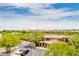 Expansive community view featuring well-maintained landscaping, building architecture, and ample parking at 5350 E Deer Valley Dr # 4239, Phoenix, AZ 85054