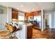 Modern kitchen with stainless steel appliances, granite countertops, and barstool seating at 5350 E Deer Valley Dr # 4239, Phoenix, AZ 85054