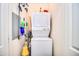 Convenient laundry closet with stacked washer and dryer, maximizing space and functionality at 5350 E Deer Valley Dr # 4239, Phoenix, AZ 85054