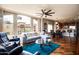 Open concept living room with a couch, hardwood floors, and views at 5350 E Deer Valley Dr # 4239, Phoenix, AZ 85054