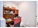 A small office space with a desk and overhead storage at 5350 E Deer Valley Dr # 4239, Phoenix, AZ 85054