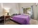 Bright bedroom with a large window and cozy decor at 5428 W Wethersfield Dr, Glendale, AZ 85304