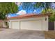Lovely home featuring an attached two car garage, mature landscaping, and classic desert charm at 5428 W Wethersfield Dr, Glendale, AZ 85304