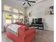 Bright living room featuring vaulted ceilings, large windows, and modern decor at 5428 W Wethersfield Dr, Glendale, AZ 85304
