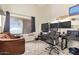 Office space featuring natural light, work space and sitting area at 5428 W Wethersfield Dr, Glendale, AZ 85304