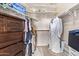 Walk-in closet with dresser, shelving and hanging storage at 5428 W Wethersfield Dr, Glendale, AZ 85304