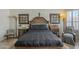 Nicely decorated bedroom featuring dark wood furnishings and ample lighting at 5900 W Orchid Ln, Chandler, AZ 85226