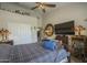 Comfortable bedroom showcasing a large closet and elegant furnishings at 5900 W Orchid Ln, Chandler, AZ 85226
