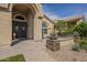 Attractive home entryway with stone accents, desert plants, and a charming 'Welcome' sign at 5900 W Orchid Ln, Chandler, AZ 85226