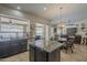Kitchen island with stainless appliances, granite countertops and island at 5900 W Orchid Ln, Chandler, AZ 85226