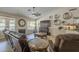 Cozy living room featuring a ceiling fan, tile floors, and ample seating at 5900 W Orchid Ln, Chandler, AZ 85226