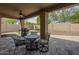 Covered patio area perfect for outdoor dining and entertaining with a built-in grill at 5900 W Orchid Ln, Chandler, AZ 85226