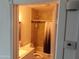 Updated bathroom features a shower-tub combo at 610 E Estevan Ave, Apache Junction, AZ 85119