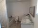 Modern bathroom with double sinks, vanity and a tub, creating a relaxing and functional space at 610 E Estevan Ave, Apache Junction, AZ 85119