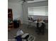 Versatile room with wood-look floors, suitable for a home office, study, or guest room at 610 E Estevan Ave, Apache Junction, AZ 85119