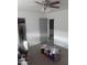 Well-lit bedroom with a ceiling fan and closet space, providing comfort and storage at 610 E Estevan Ave, Apache Junction, AZ 85119