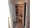 Linen closet offers organized storage at 610 E Estevan Ave, Apache Junction, AZ 85119