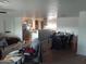 A spacious living room featuring hard flooring and an open concept design at 610 E Estevan Ave, Apache Junction, AZ 85119