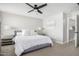 Comfortable bedroom showcasing neutral tones and soft natural lighting at 672 S Porter St, Gilbert, AZ 85296