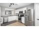 Well-lit kitchen with stainless steel appliances and an open layout design at 672 S Porter St, Gilbert, AZ 85296