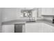 Open concept kitchen with a stainless steel dishwasher and a view at 672 S Porter St, Gilbert, AZ 85296