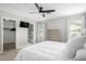 Bright main bedroom featuring ample closet space and an ensuite bathroom at 672 S Porter St, Gilbert, AZ 85296