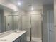 Stylish bathroom with a sleek vanity, modern fixtures, and a spacious glass-enclosed shower with elegant tile work at 7244 E Hackamore Ln, San Tan Valley, AZ 85143