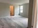 Spacious bedroom features neutral carpeting, natural light from the window, and ensuite access at 7244 E Hackamore Ln, San Tan Valley, AZ 85143