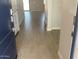 Inviting entryway featuring stylish, light-toned tile flooring that seamlessly connects to the rest of the home at 7244 E Hackamore Ln, San Tan Valley, AZ 85143
