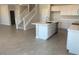 Open concept kitchen features a center island, modern appliances, and sleek finishes for a contemporary look at 7244 E Hackamore Ln, San Tan Valley, AZ 85143