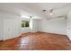 Large bonus room featuring tile floors, a closet, and ample natural light at 7502 E Princeton Ave, Scottsdale, AZ 85257