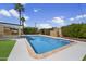 Sparkling pool with lush landscaping creates a backyard oasis at 7502 E Princeton Ave, Scottsdale, AZ 85257