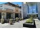 Charming outdoor patio area of a restaurant with elegant seating, lush greenery, and a welcoming atmosphere at 7502 E Princeton Ave, Scottsdale, AZ 85257