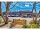 Charming small-town view featuring local businesses, shaded sidewalks, and a welcoming bench at 7502 E Princeton Ave, Scottsdale, AZ 85257