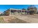 Charming single-story home showcasing a covered entry and well-maintained desert landscaping in the front yard at 7520 E Papago Dr, Scottsdale, AZ 85257