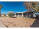View of a single-story home with desert landscaping, providing a glimpse of comfortable suburban living at 7520 E Papago Dr, Scottsdale, AZ 85257