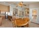 Kitchen and dining area combination with stainless steel appliances and lots of light at 7916 W Mary Ann Dr, Peoria, AZ 85382