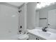 Cozy bathroom with a tub and a white sink with modern fixtures at 881 W Saragosa St, Chandler, AZ 85225