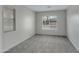 Cozy bedroom featuring soft carpet and ample natural light at 881 W Saragosa St, Chandler, AZ 85225